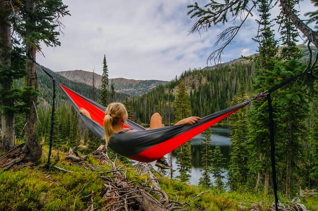 Summer break - woman in hammock in mountains