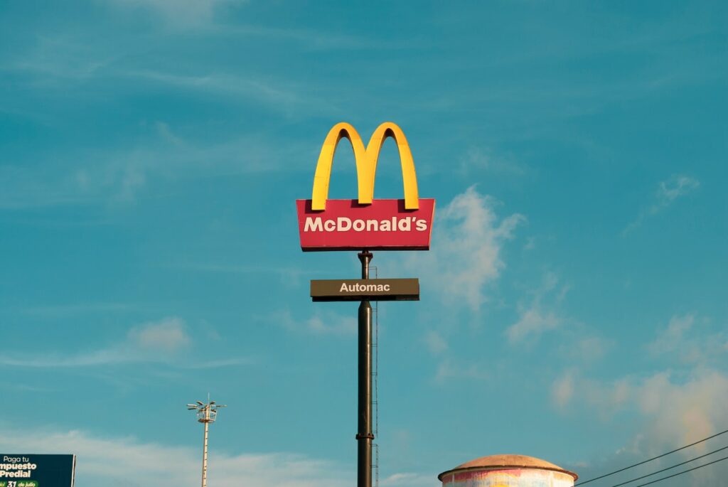 McDonald's sign. The are different methods to infer causal relationships, such as in the study of fast-food salaries.
