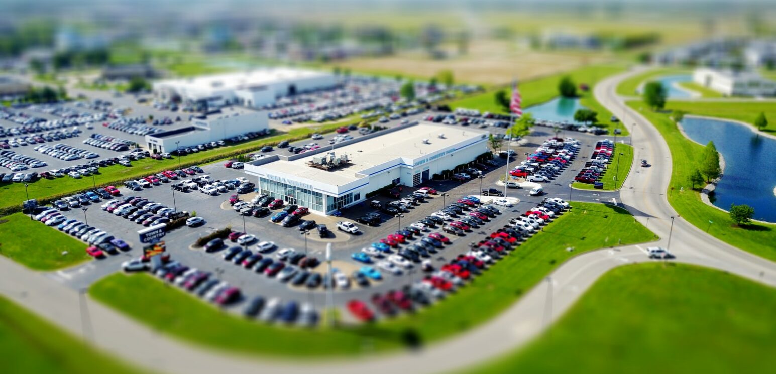 supply chain issues have affected the car-buying process Photo by David McBee: https://www.pexels.com/photo/aerial-photo-of-building-395537/