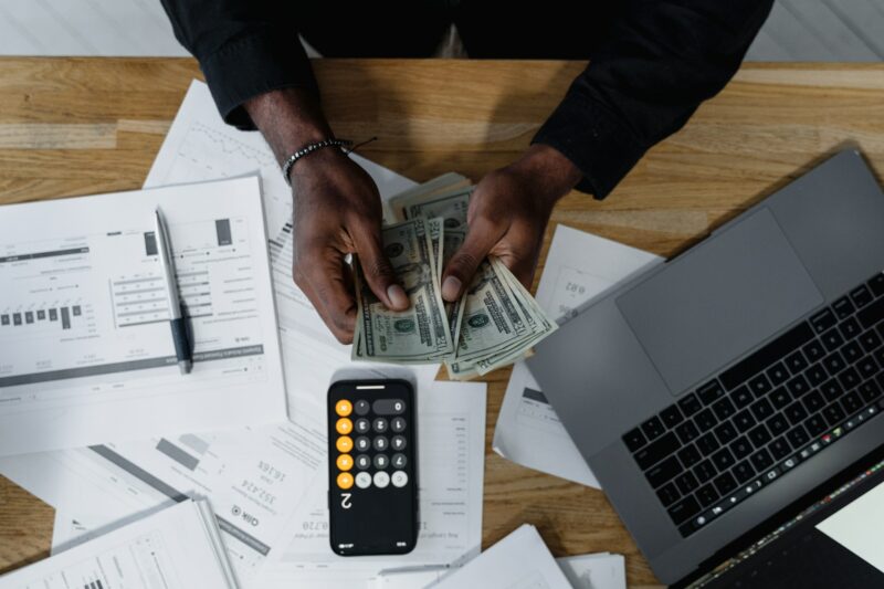 have the proper tax withheld by filing a correct W-4. Photo by Tima Miroshnichenko: https://www.pexels.com/photo/person-holding-a-black-remote-control-6694569/